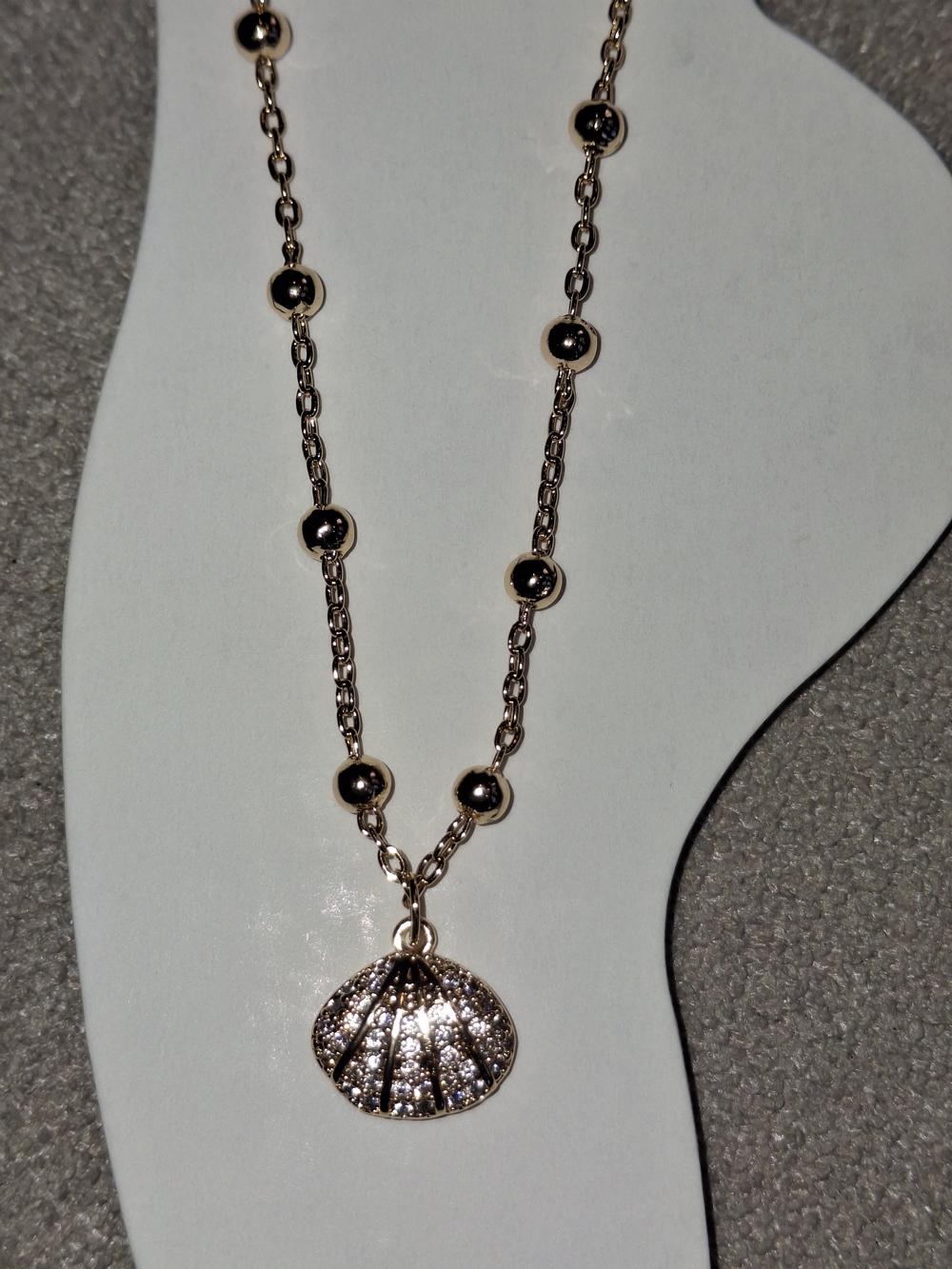 Gold-Tone Shell Pendant Necklace with Clear Crystal Accents